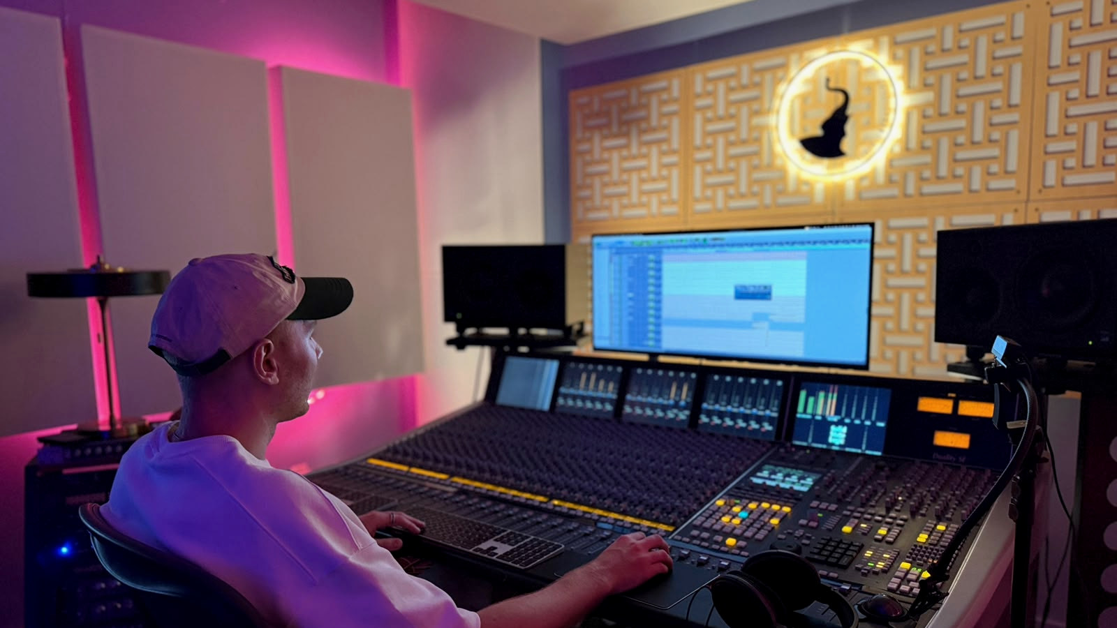 ØSTMOE working at a professional mixing console